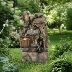 LuxenHome Resin Stacked Rock Wall And Barrel Outdoor Fountain With Lights Brown -LuxenHome GUEST 0fcac865 180e 4abc 87c0 962352e3f8f2