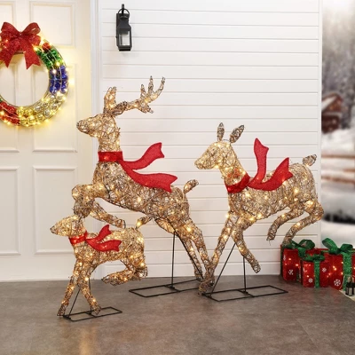 LuxenHome 3-Piece Natural And Plastic Rattan Running Reindeer Holiday Decoration Set With Lights Brown 1 LuxenHome 3-Piece Natural And Plastic Rattan Running Reindeer Holiday Decoration Set With Lights Brown