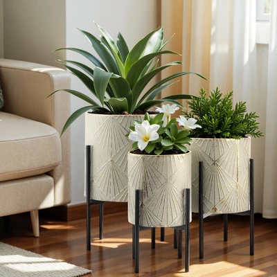 LuxenHome Set Of 3 Gray And Gold Metal Cachepot Planters With Black Stand 1 LuxenHome Set Of 3 Gray And Gold Metal Cachepot Planters With Black Stand