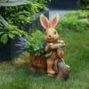 LuxenHome Brown Bunny On A Bicycle MgO Planter