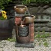 LuxenHome 23" H Bowls And Bricks Resin Outdoor Fountain With Lights Brown