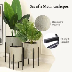 LuxenHome Set Of 3 Gray And Gold Metal Cachepot Planters With Black Stand 15 LuxenHome Set Of 3 Gray And Gold Metal Cachepot Planters With Black Stand -LuxenHome GUEST 79df8dd7 5780 4450 b1d6 7305e8bae508