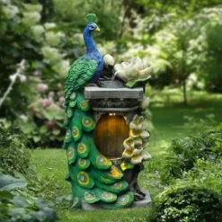 LuxenHome Resin Blue And Green Peacock Outdoor Fountain Garden Fountain With LED Light -LuxenHome GUEST b5347d40 2e5c 4efb 96ba 92b1651f36c4
