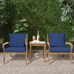 LuxenHome Outdoor Acacia Wood Side Table And Set Of 2 Armchairs With Blue Cushions -LuxenHome GUEST bd4f9411 e137 485d bf3c 1385c4905ade